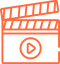 A minimalist icon illustration of a film clapper board with a centered play button symbol, rendered in orange lines.